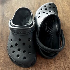 Used Woman’s size 8 men’s size 6 Black Crocs